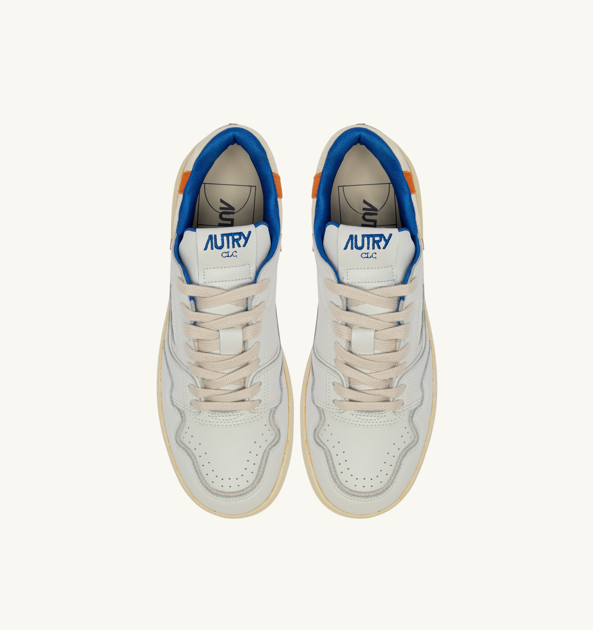 BASKETS CLC LOW EN CUIR BLANC ET FANTA