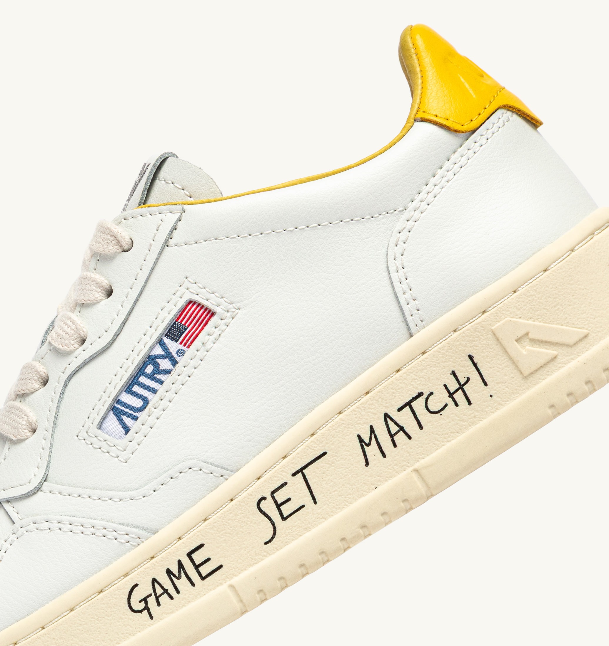 BASKETS MEDALIST LOW EN CUIR BLANC ET SLICKER